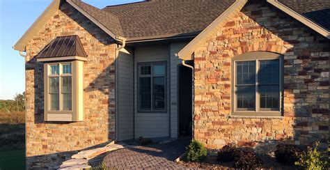 stone siding metal and wood sided house|solid stone siding for homes.